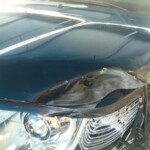 Before and after photographs of a damaged, black, Range Rover that was repaired by Elite Paint & Body Shop in West Palm Beach, FL.